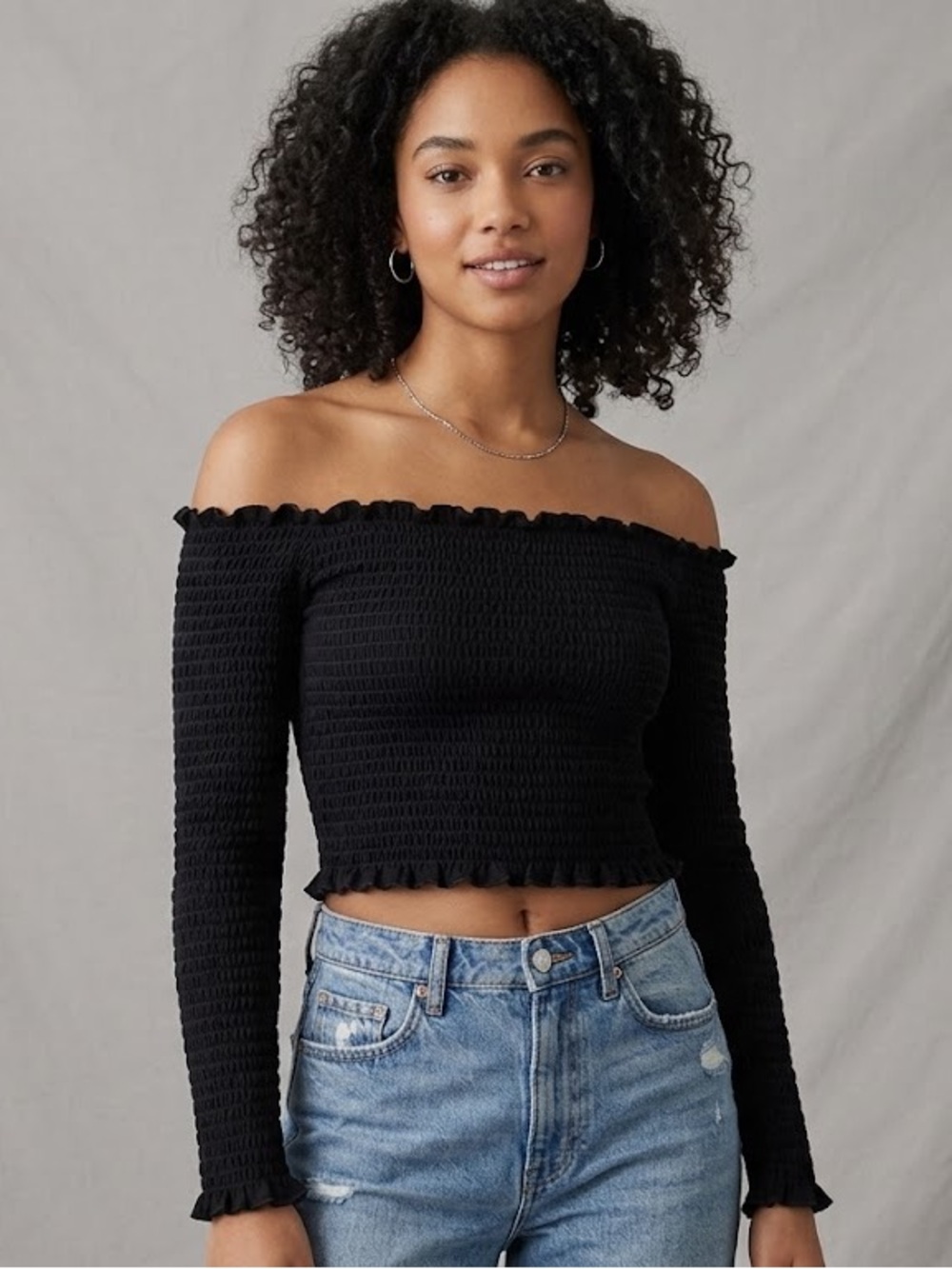 Black Smocked Off-Shoulder Crop Top by Nameless